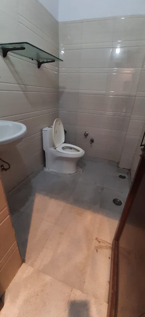 Modern bathroom in luxury PG Laxmi Nagar Delhi